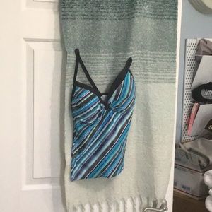 Multiple colors in harmony made this top my go-to before I gained weight.